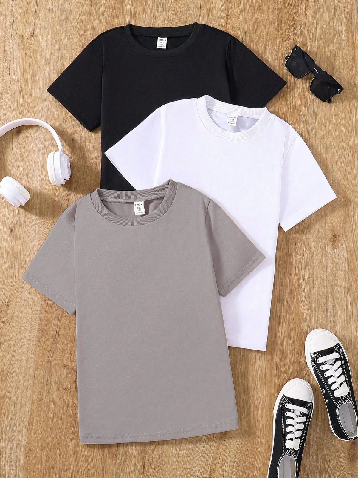 SHEIN Conjunto de 3 piezas para niño preadolescente con camisetas de manga corta de punto multicolor para el verano