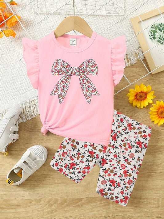 SHEIN Conjunto de 2 piezas para niña: Camiseta de manga corta con estampado de flores y moño, y shorts de ciclista con estampado floral digital. Conjunto lindo para primavera/verano, uso diario y vacaciones
